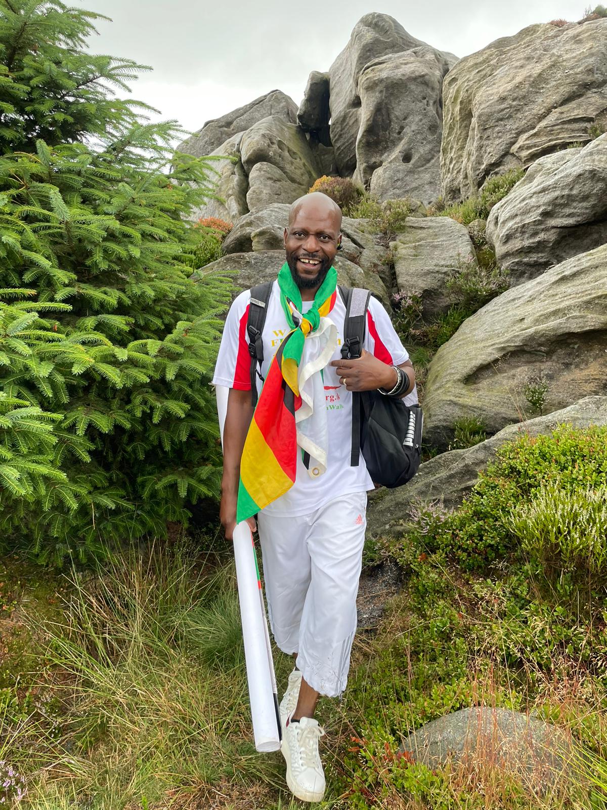 Moses next to the outcrop called Simon's Seat